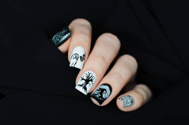 Fall Halloween Nails with autumn colors and Halloween nail art